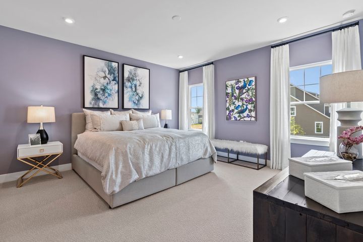 primary bedroom with large windows