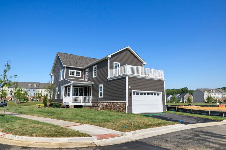 rear exterior with outdoor living