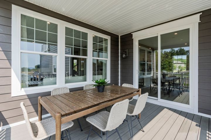 covered porch with sliding door