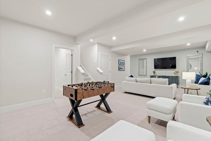 recreation room on lower level with recessed lights
