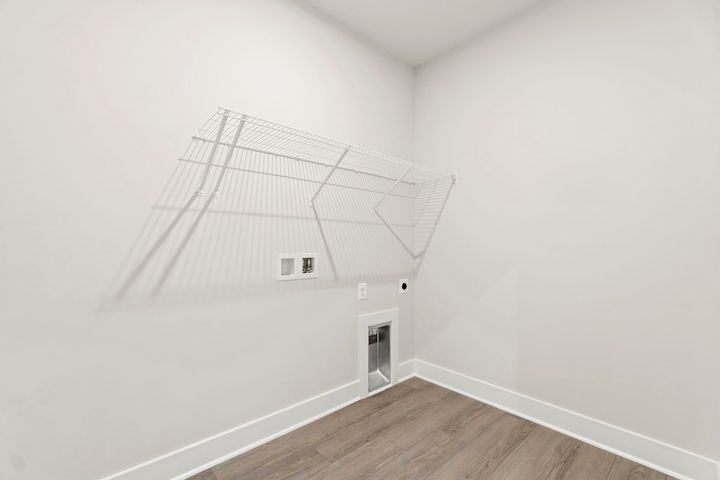 laundry room with wire shelving