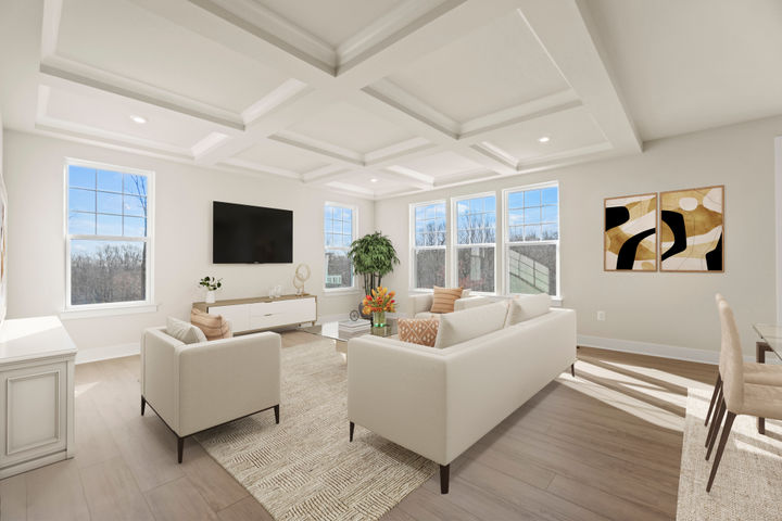 family room with coffered ceiling