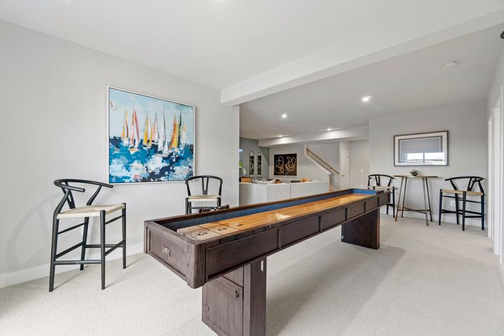 lower level recreation room in finished basement