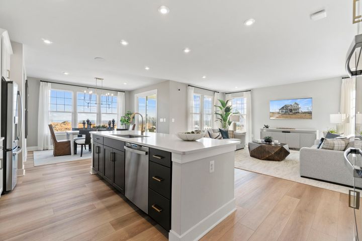 open kitchen flow to family and dining area