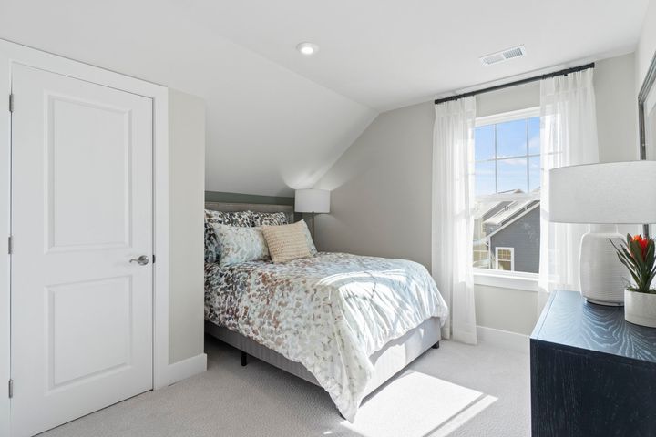 Home Office in Loft staged as guest bedroom