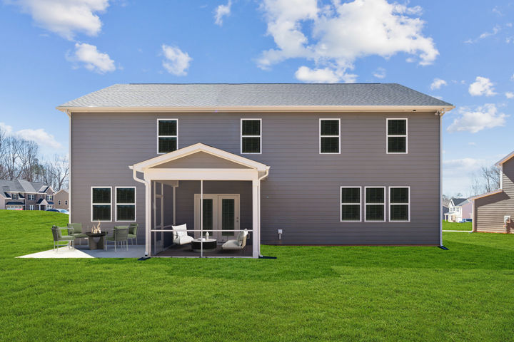 Rear Exterior with Screened Porch and Patio