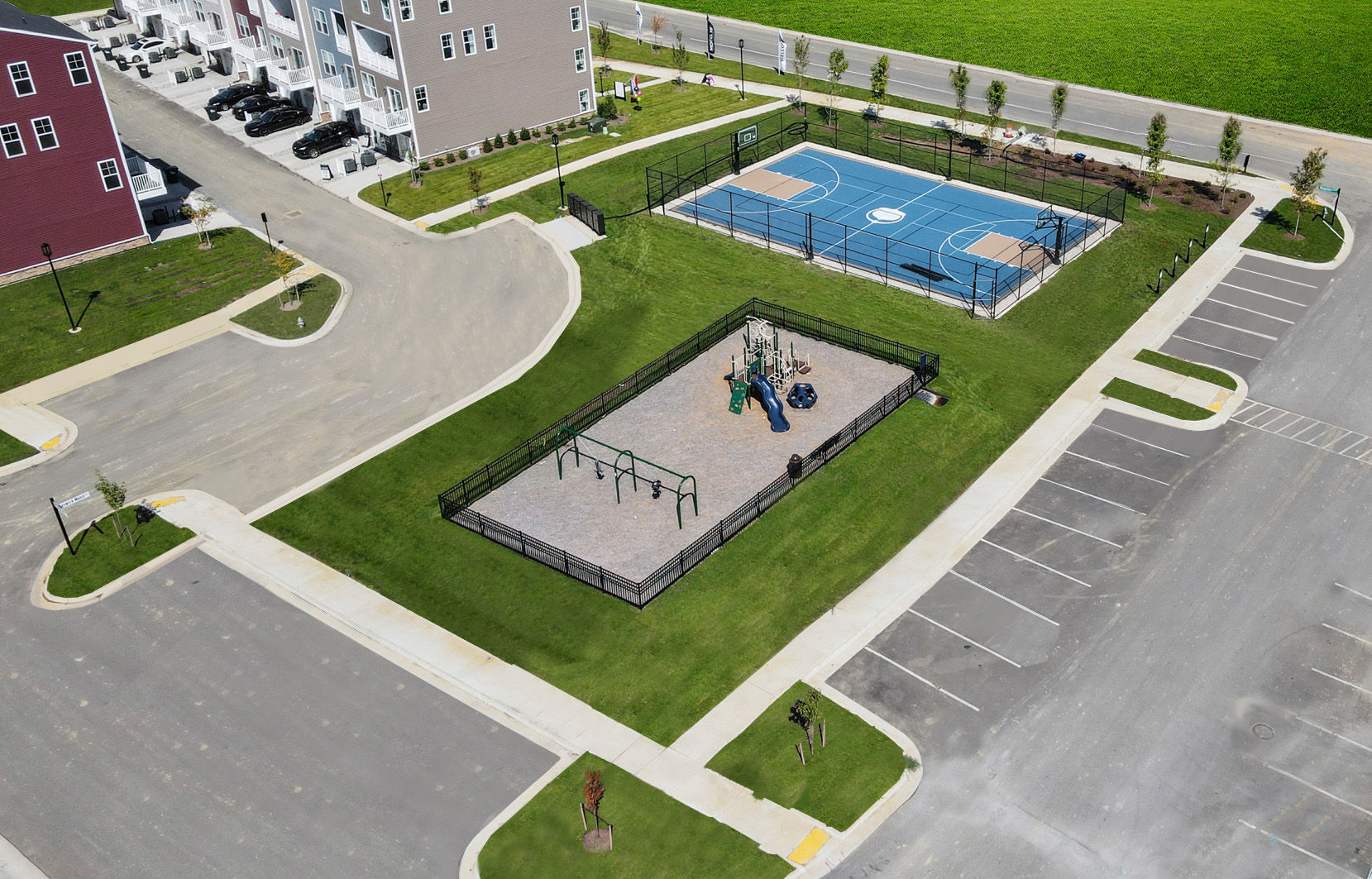 Aerial view of sports court and playground amenity