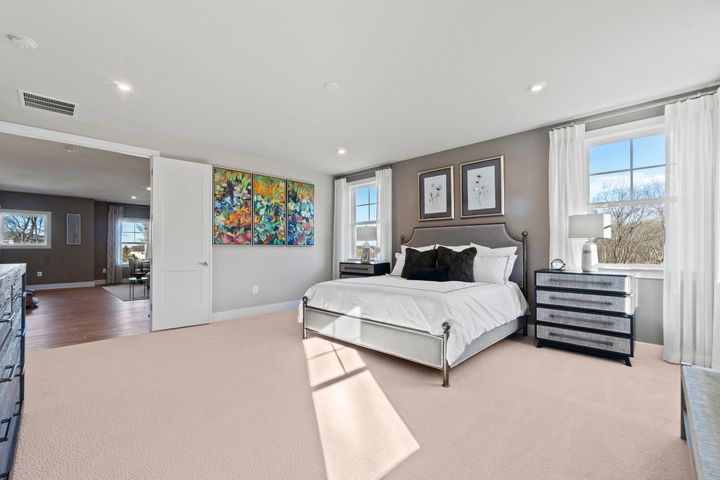 primary bedroom with double door entry