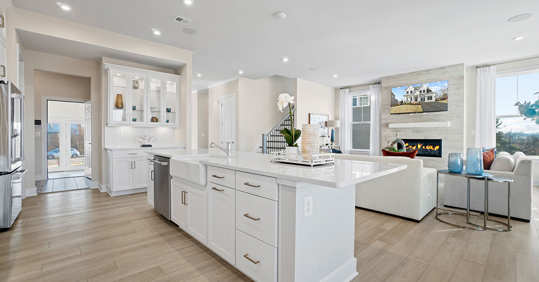 kitchen island with sink dishwasher cabinet storage and seating