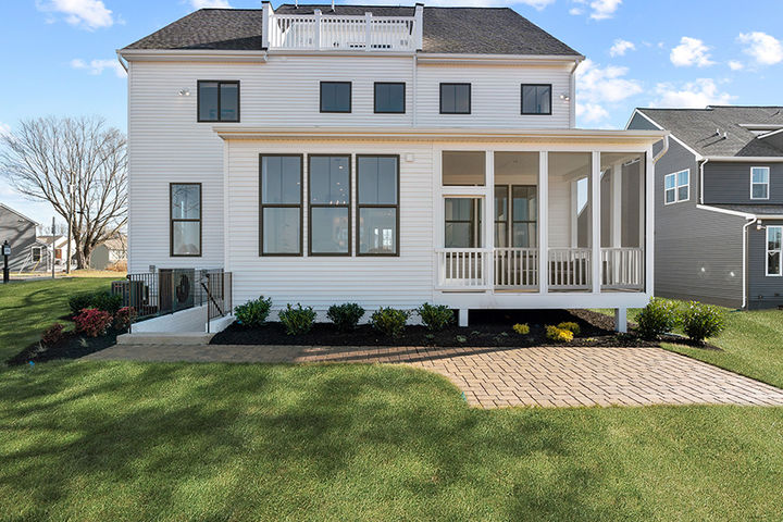 rear exterior with deck terrace and patio