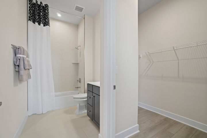 Main Level Bedroom Suite with Bathroom and Walk in Closet