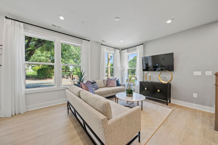 family room with bright windows