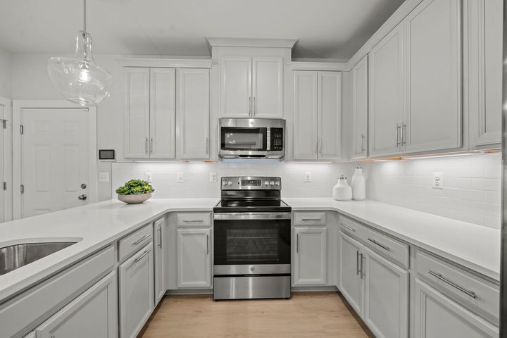 kitchen with under cabinet lighting