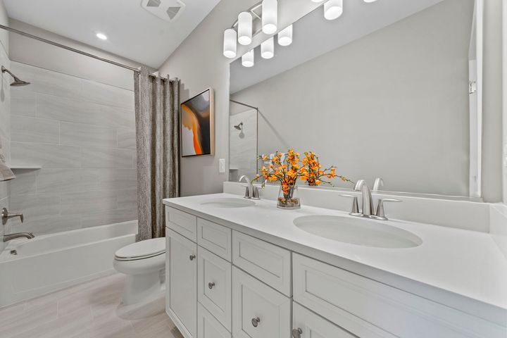 tub shower with double sink vanity