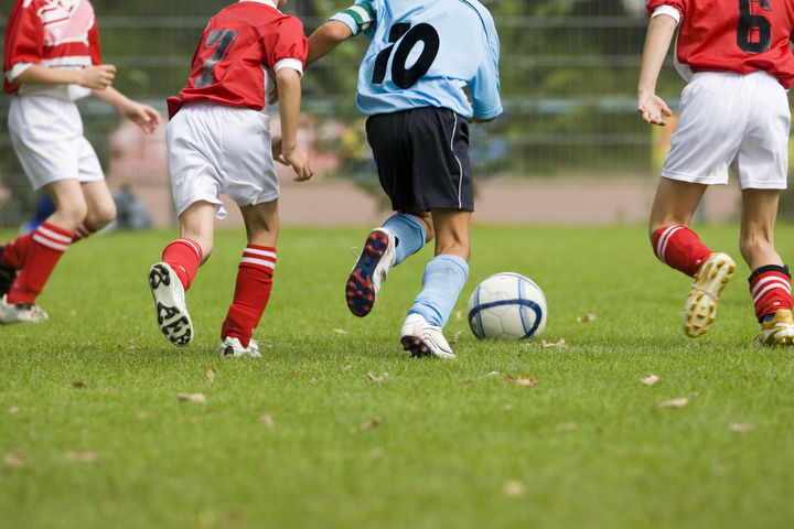 Kids playing soccer