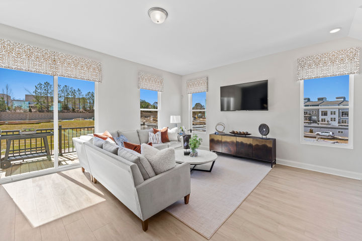 family room with bright windows