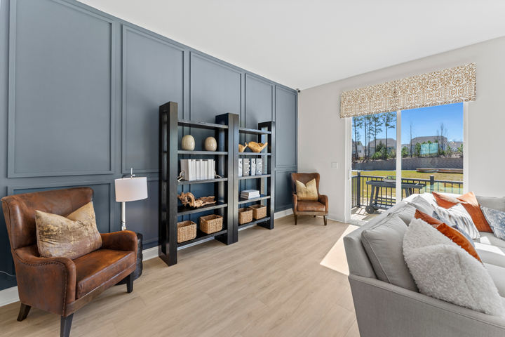 family room with sliding door to deck