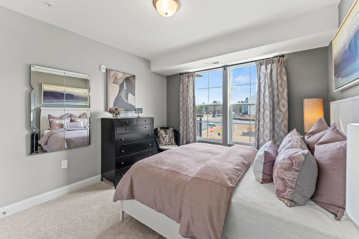 second bedroom with bright windows