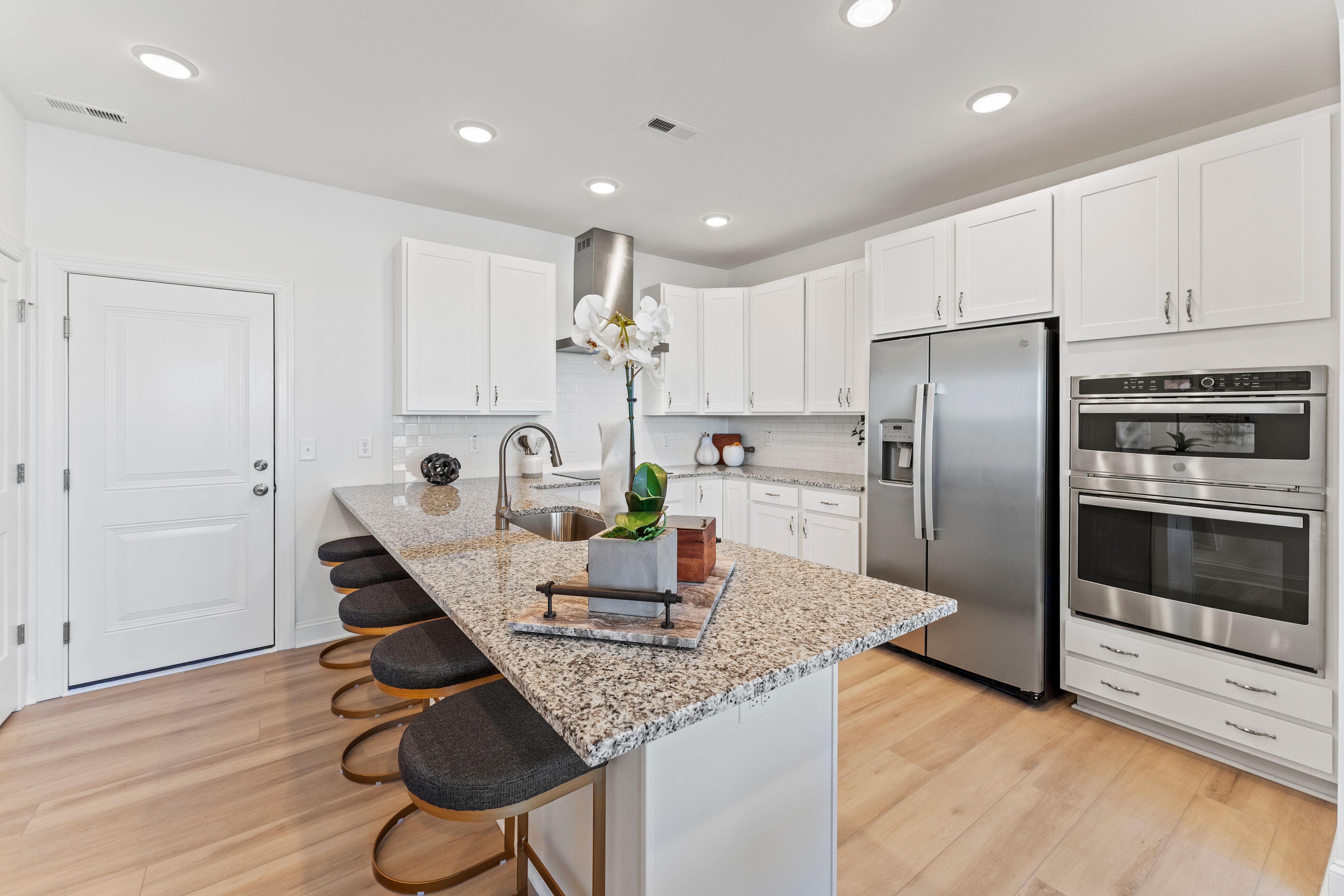 kitchen with large island and abundant cabinet space