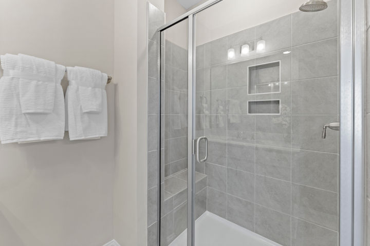 Primary tile shower with seat