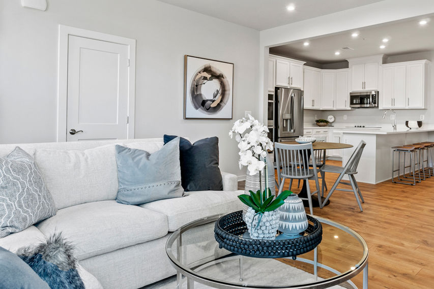 Open floorplan view of family room into kitchen