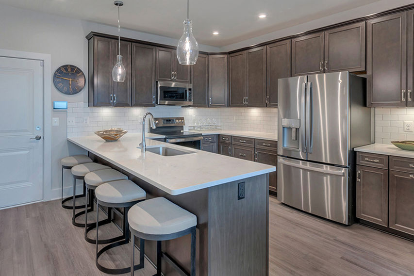 Living room and dining space in The Tessa
