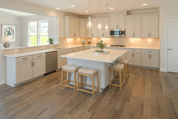 kitchen with white cabinets and countertops