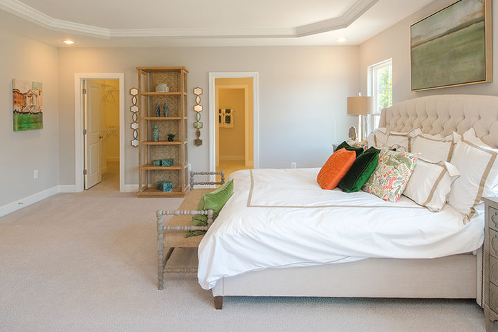 primary bedroom with bath and closet