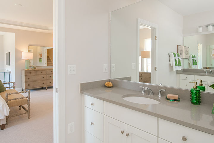 primary bath with cabinet vanity