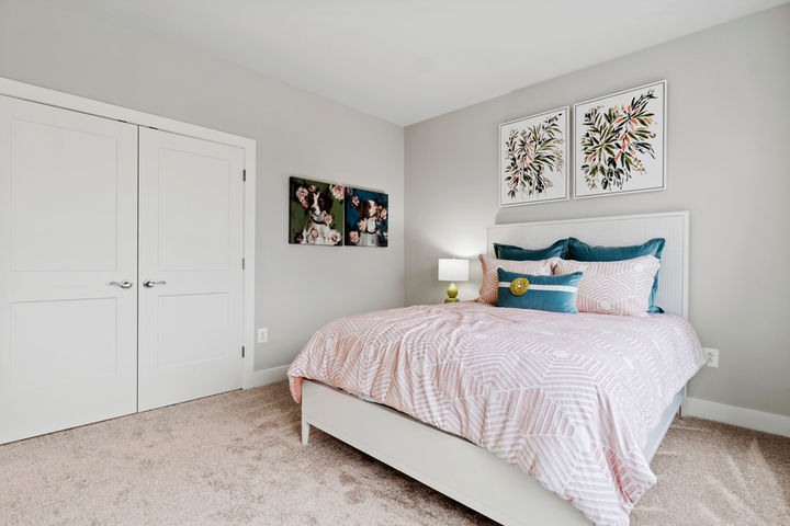 bedroom with double door closet