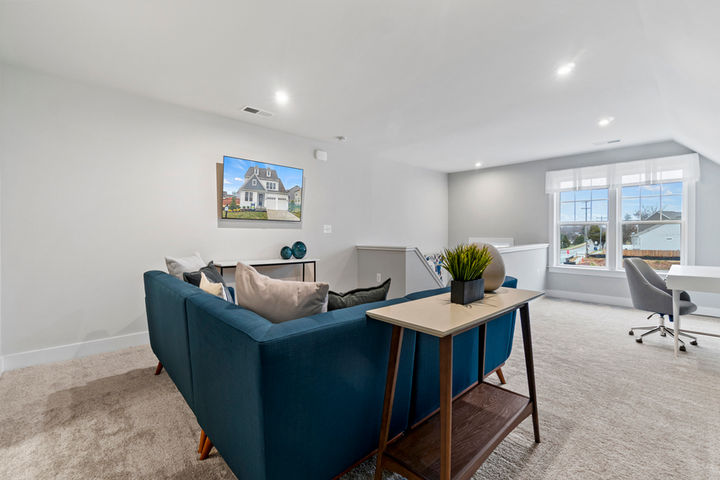 loft staged as second family room