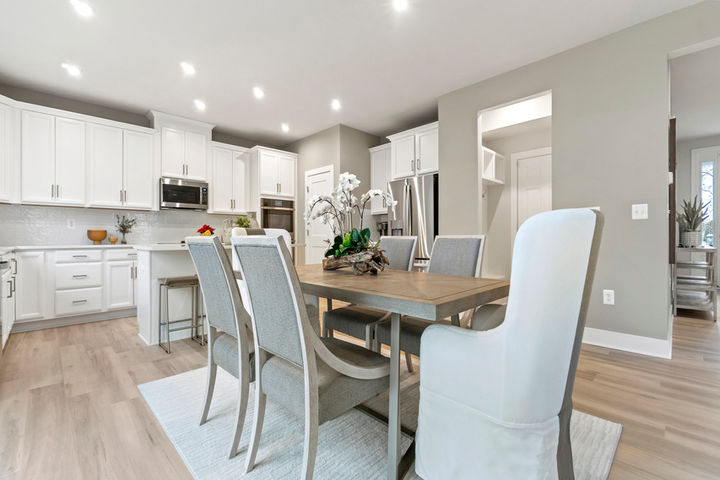 dining area next to open kitchen