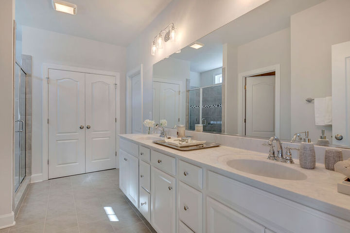 primary bath with dual vanities