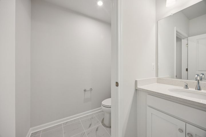 Primary bathroom with separate toilet area