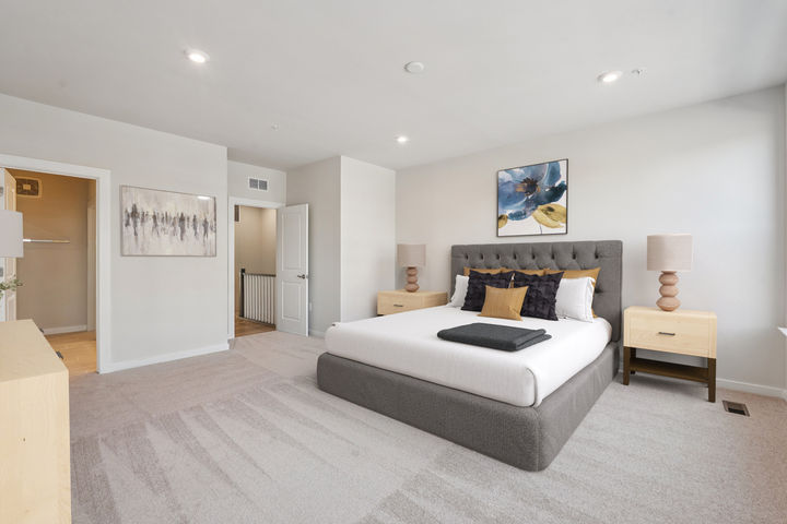 Primary Suite with Ensuite Bathroom and Dual Walk in Closets