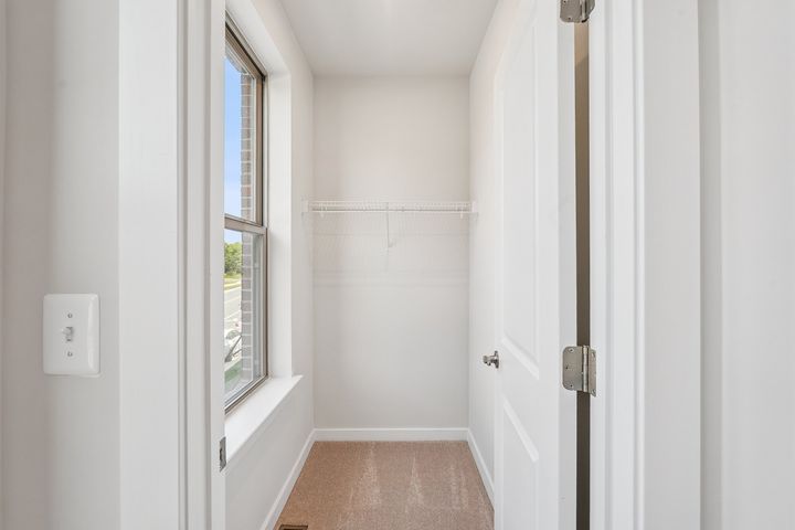 One of Two Primary Walk in Closets