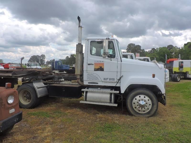 solid 1990 Freightliner Road Tractor Day Cab truck