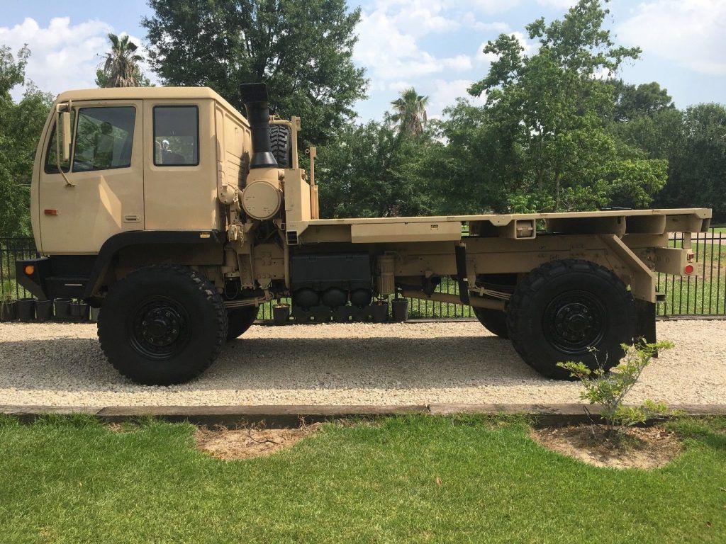 clean 1998 Stewart & Stevenson LMTV M1078 4X4 Military Flatbed Truck