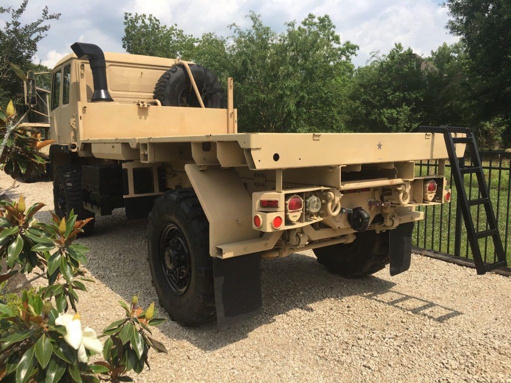 clean 1998 Stewart & Stevenson LMTV M1078 4X4 Military Flatbed Truck