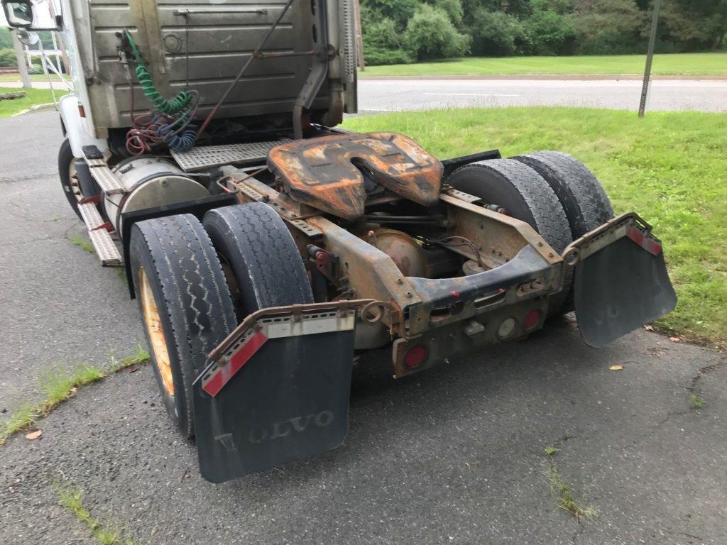 solid 2003 Volvo VNM truck