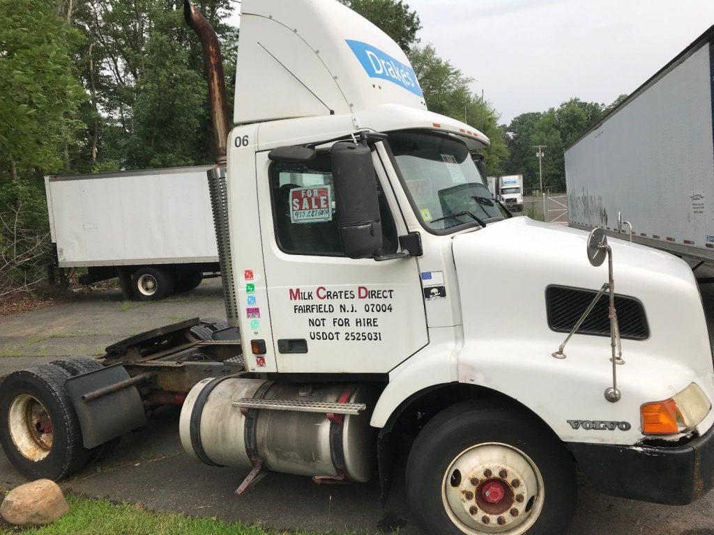 solid 2003 Volvo VNM truck