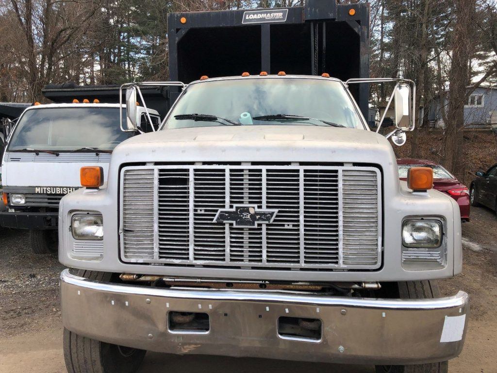 strong and solid 1994 Chevrolet C7500 Garbage Truck