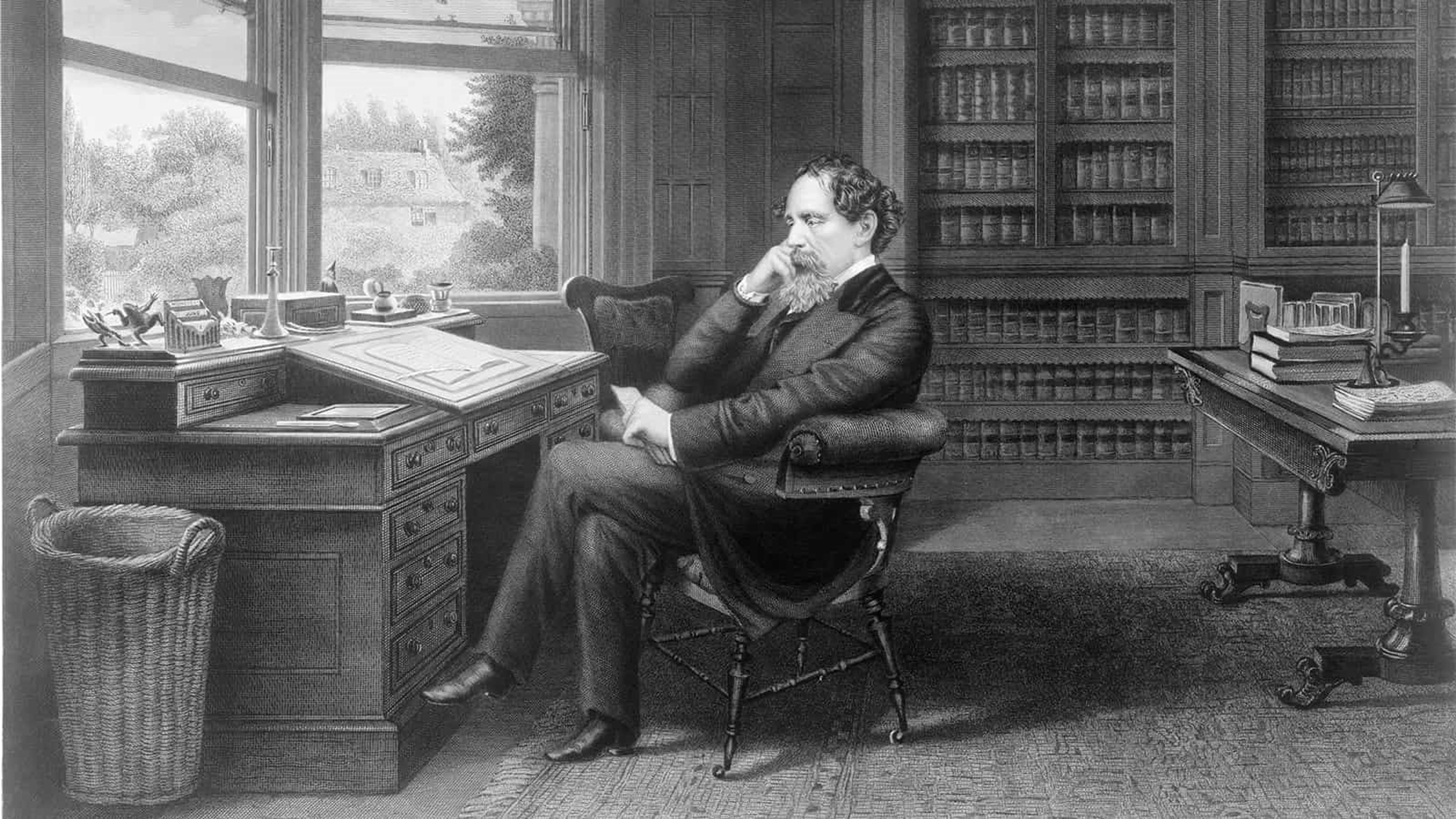 Black and white drawing of Charles Dickens sat at his desk