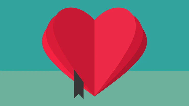 Heart-shaped book on a two tone background