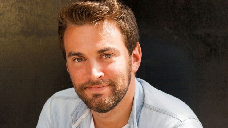 Jonny Benjamin smiles to the camera