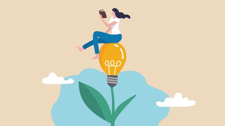 A woman sits rather on a light bulb growing out of a plant