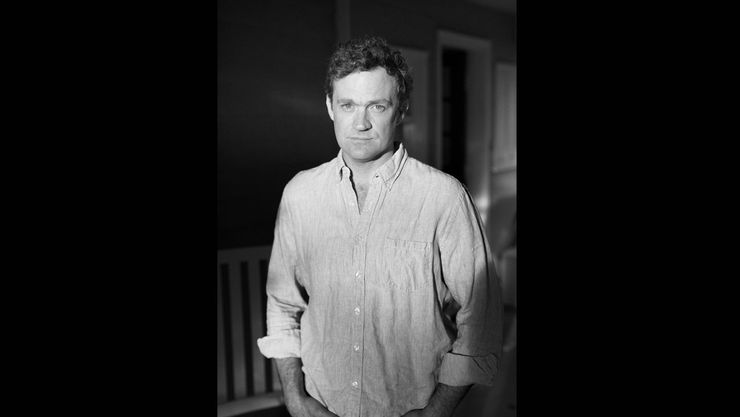 Black and white photograph of Patrick Radden Keefe