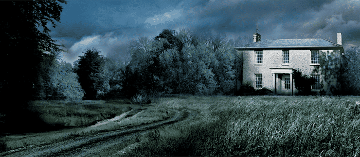 A housethat resembles White House Farm, at Night