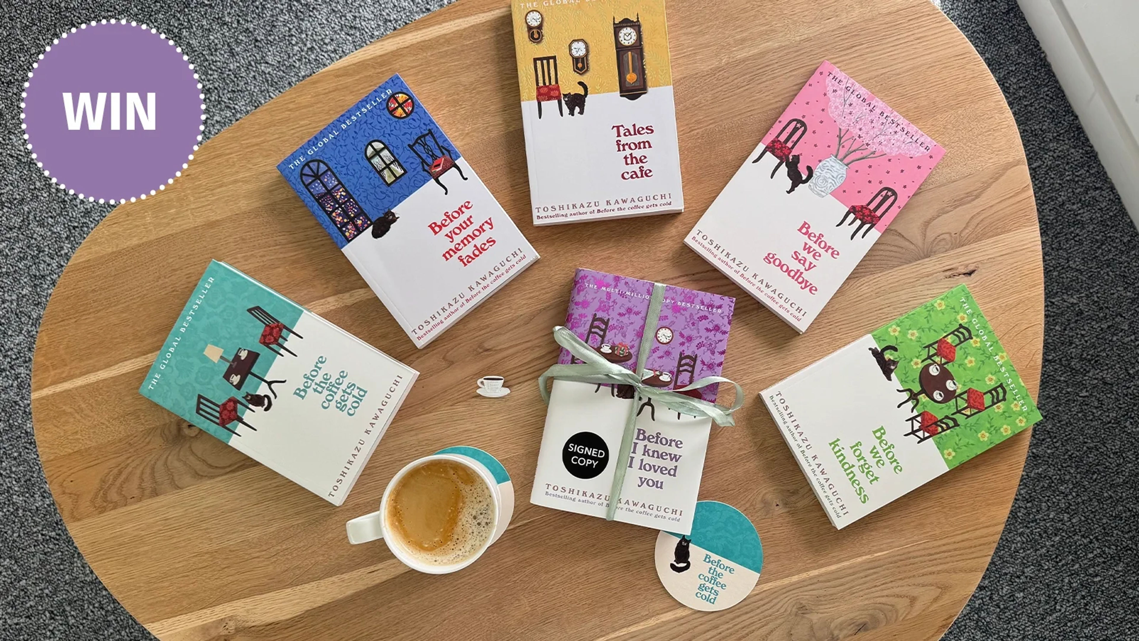 6 before the coffee gets cold books on a table with coffee, coasters and pin badge