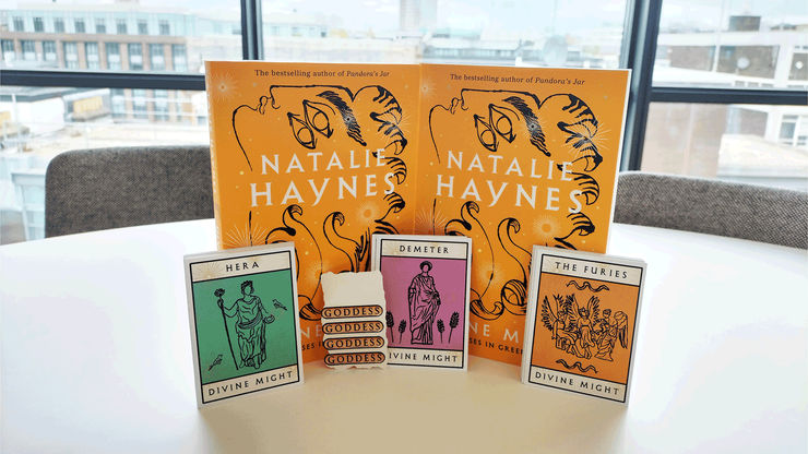 Divine Might papberback books with goddess tarot cards and goddess stickers
